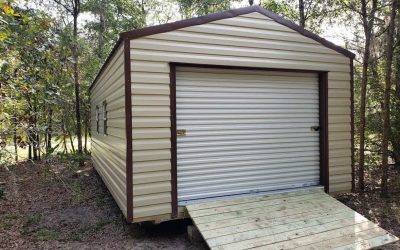 Garage shed with wooden ramp